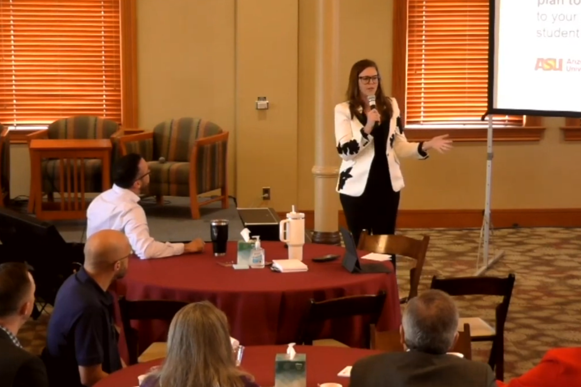 Woman talking at a conference